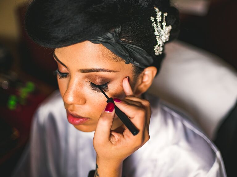 Bride getting her makeup done