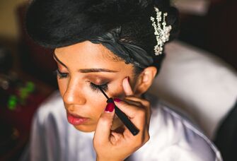 Bride getting her makeup done