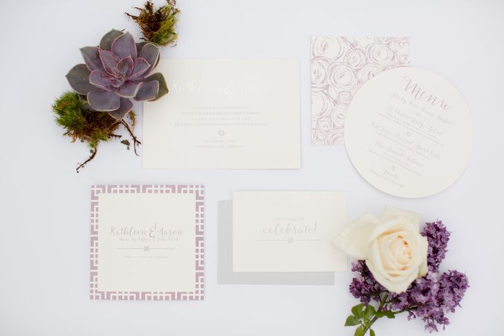 Idieh Designs captured the essence of the couple’s romantic, spring theme in an invitation suite with pale purple hues, whimsical script fonts and floral detailing.