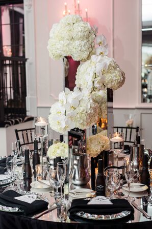 Tall Orchid and Hydrangea Centerpieces in Silver Vases