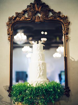 White Wedding Cake With Bird Topper