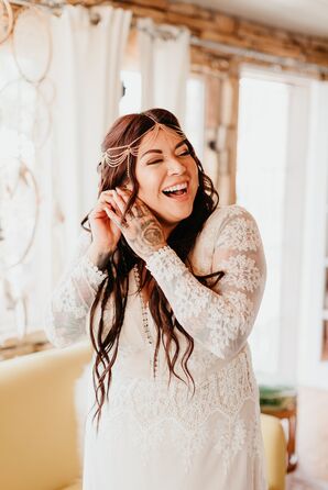 Bohemian Bride with Long-Sleeve Dress, Down Hairstyle and Hair Chains