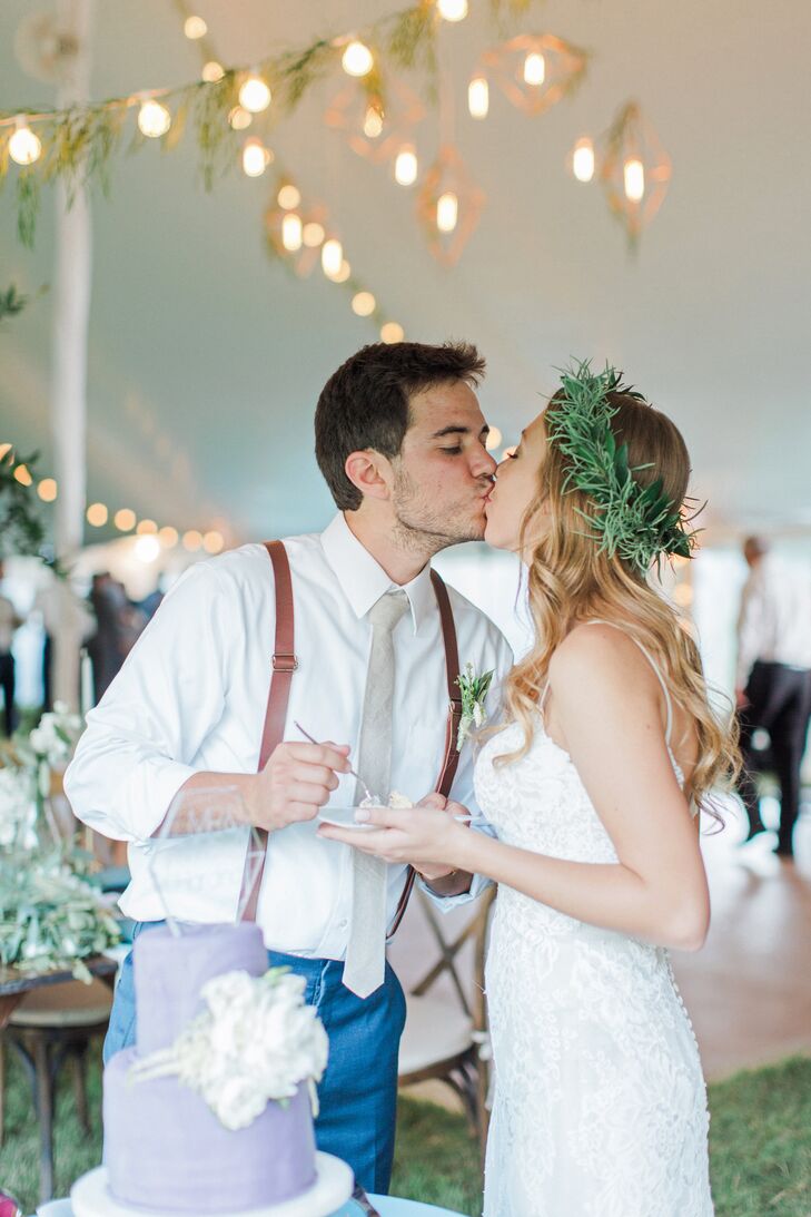 Romantic Bride and Groom During Cake Cutting