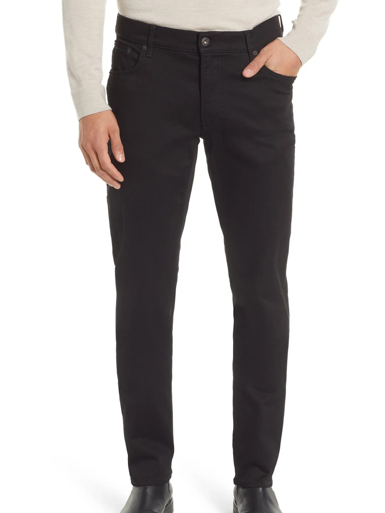 A model shows off this modern dark dress slacks.