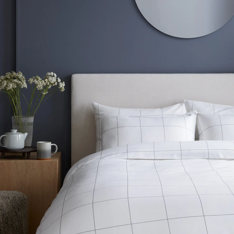 Organic cotton bedding set from Quince for a cozy 25th wedding anniversary