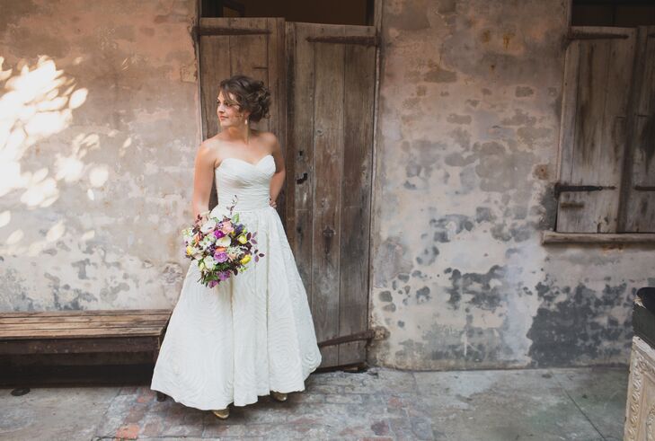 "I tried on dresses at maybe six stores between New York and New Orleans, with my mom and a number of friends, before finally finding my dress at a little local bridal shop less than a mile from my office, by myself while on my lunch break. I knew it was the one as soon as I saw it. The flower pattern breaks up the formality and keeps it fun," Tess says.