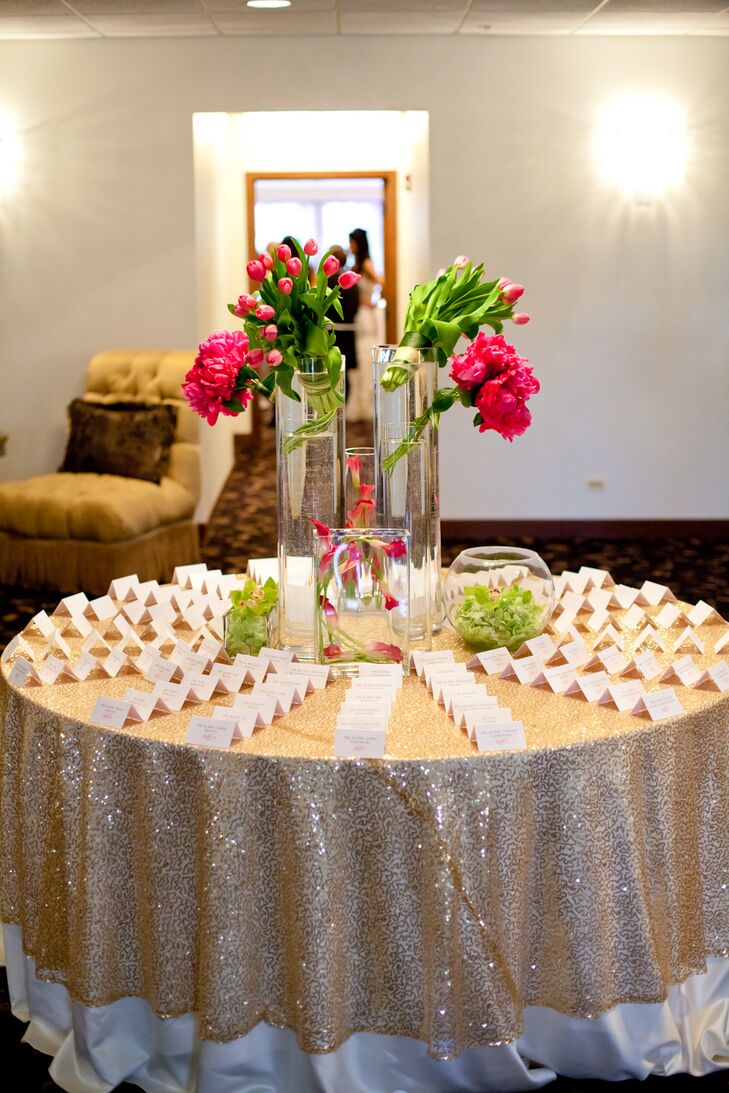 Gold Glitter Escort Table with Bright Pink and Green Centerpiece