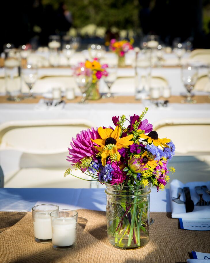 The reception tables were decorated with purple and yellow wildflowers from a flower farm up the road from the wedding site.