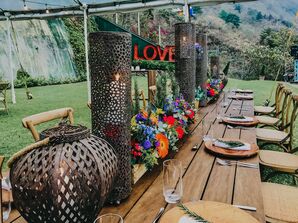 Farm Table with Colorful Centerpieces and Modern Candles