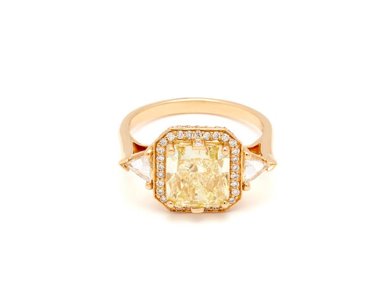 anna sheffield cushion cut yellow diamond engagement ring with round diamond halo triangular diamond sides and plain yellow gold band