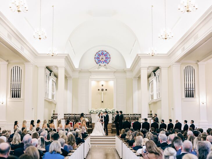Arkansas Church Ceremony With Floral Altar, Guests in Pews