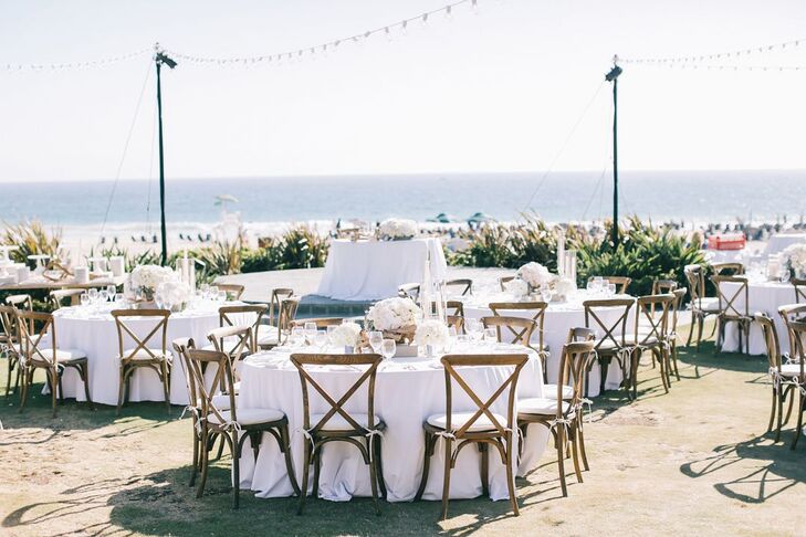 After the beach ceremony and a cocktail hour, guests headed to the nearby Dana Point, California, where there were white linen-covered tables topped with driftwood, candles and sea glass.