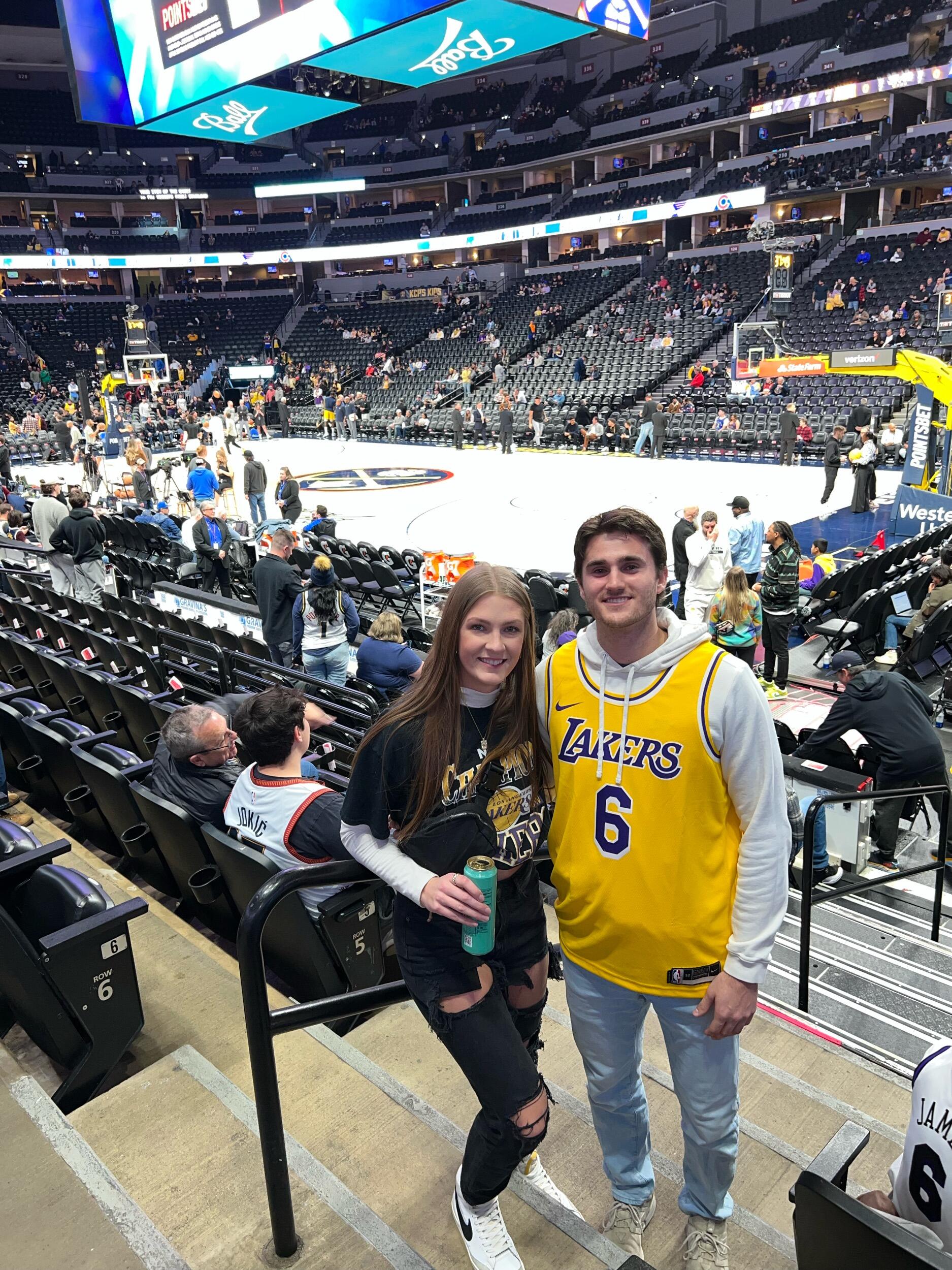 Kierstin surprised Daniel with tickets to a Lakers vs Nuggets game in Colorado.