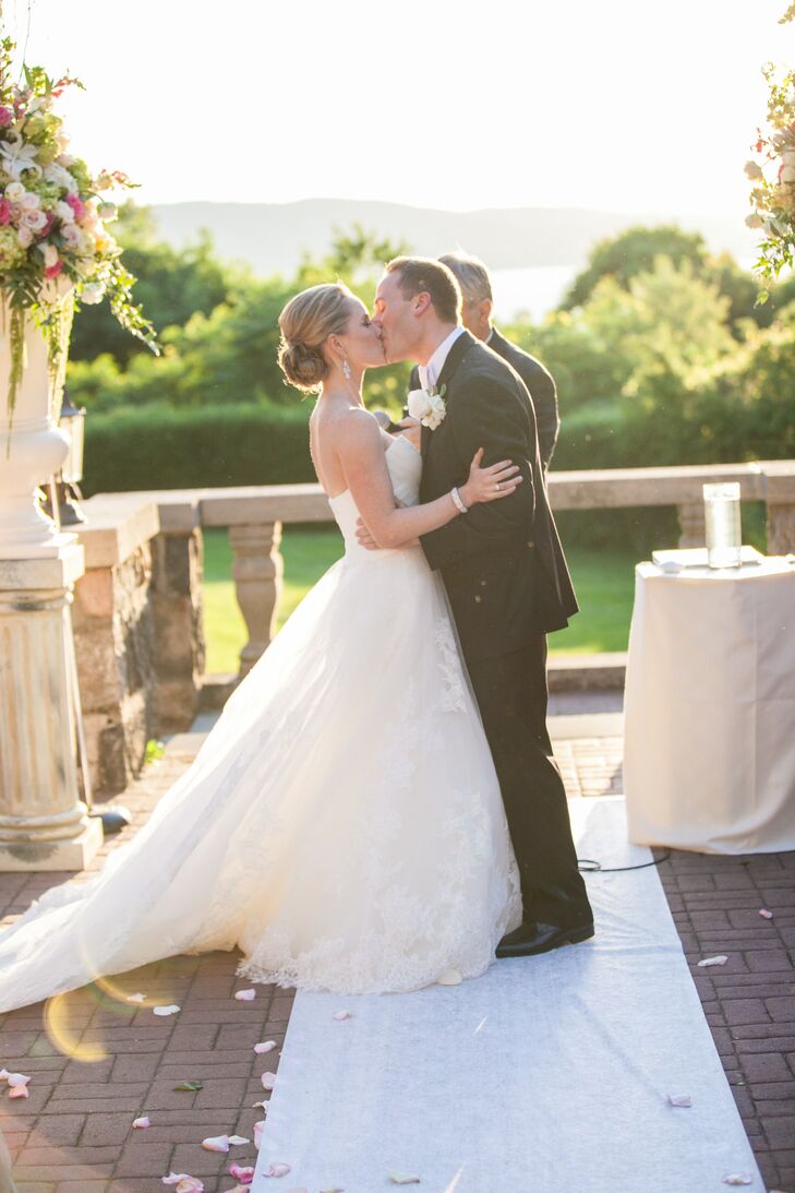 The happy newlyweds shared a kiss at the end of the ceremony.