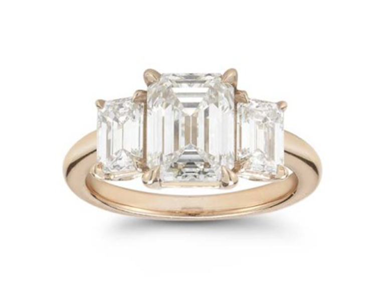 Marisa Perry rose gold emerald-cut diamond three-stone engagement ring