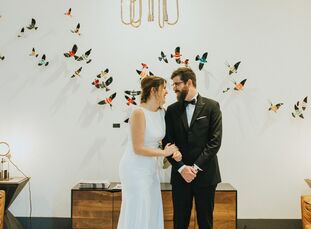 One Eleven East got splashed with bright shades for Lindsey and Bryan's wedding. “The venue is just so gorgeous and clean,” Lindsey says. “We knew tha