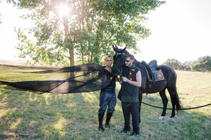 Grooms Posing With Black Horse Dressed as Unicorn