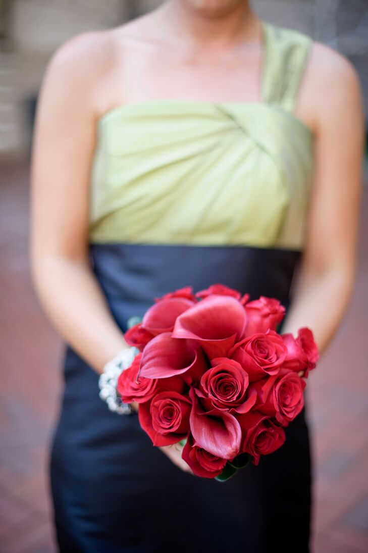 The bridesmaids carried bouquets of red calla lilies and roses with their Alfred Angelo dresses.