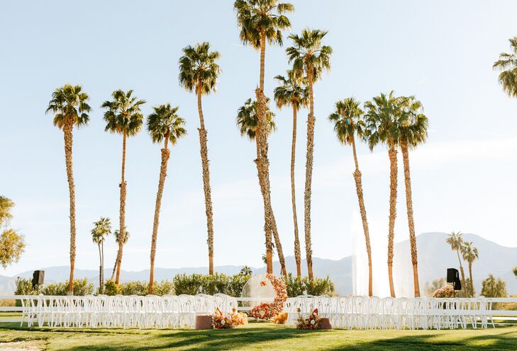Lawn Ceremony Space Under Palm Trees, Fountain With Floral Altar Structure