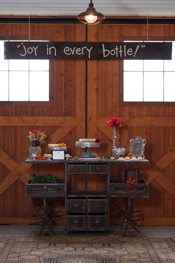 An assortment of sweet desserts sat atop this rustic wagon-themed desk.