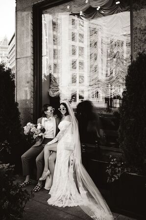 Black-and-White Photo of Fashionable Brides in Retro Sunglasses, One in Dress Another is Suit