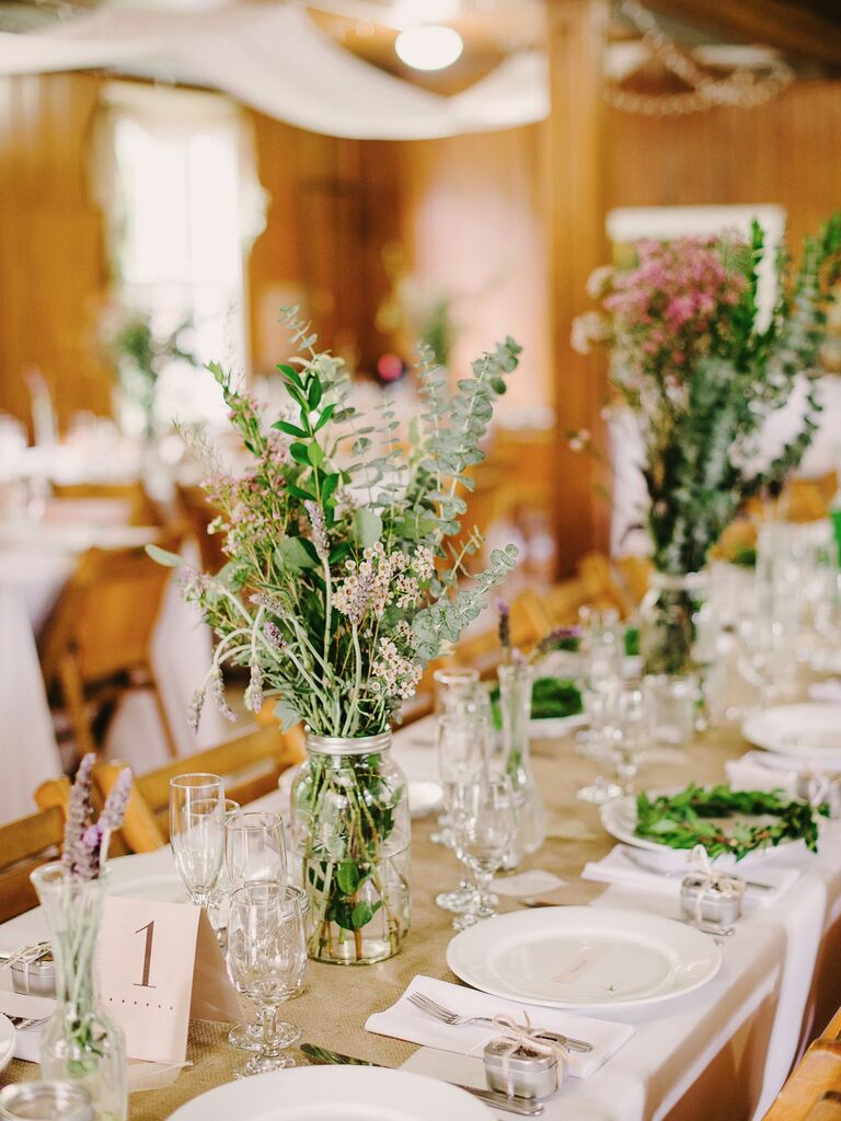 short eucalyptus wedding centerpiece in mason jar