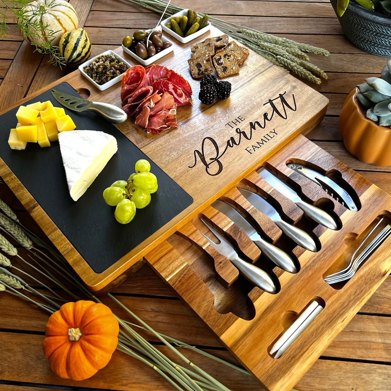 Customized charcuterie board from RedRobotEngraving on Etsy