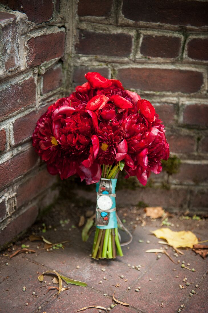 The bouquets and decor of red flowers contrasted the aqua blue decor and amplified the patriotic theme.