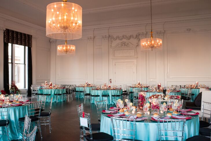 The couple’s wedding took place on July 5th, so they went with a red, white and blue color palette. They went with aqua blue for a less traditional look.