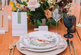 Flora and fauna patterned wedding china