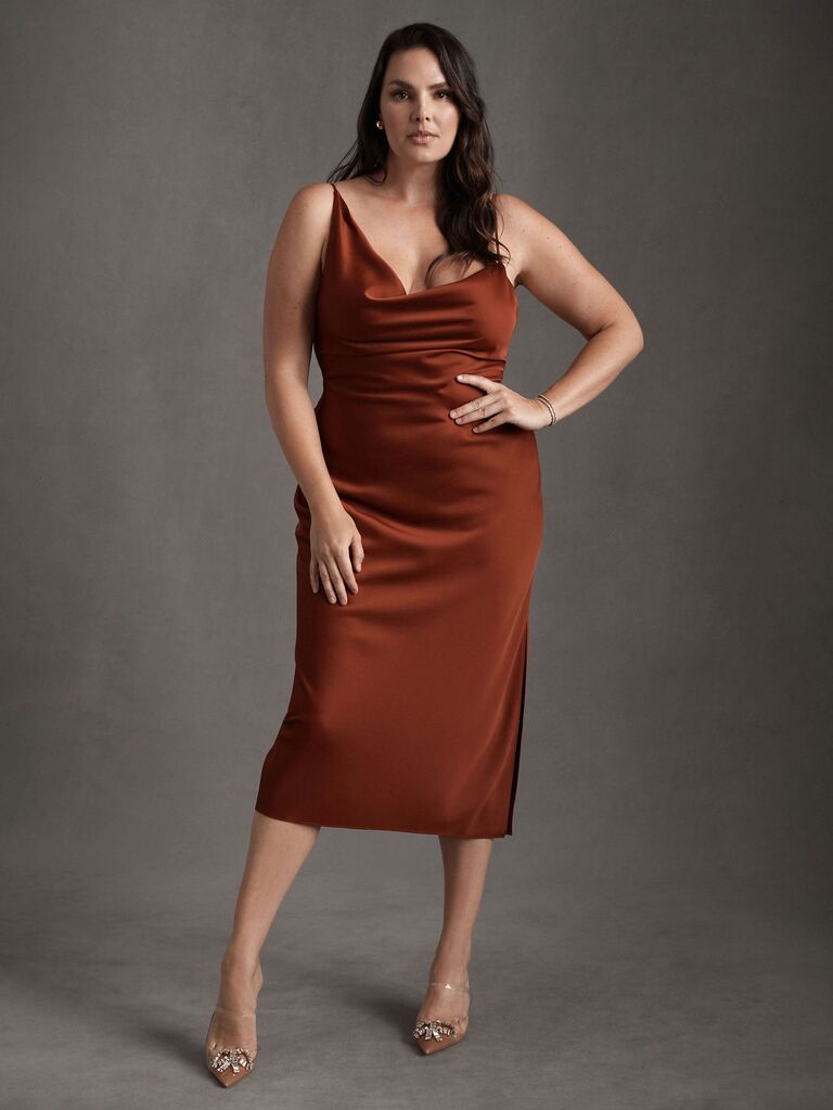 BHLDN autumn bridesmaid dress with cowl neckline and fitted skirt in dark rust