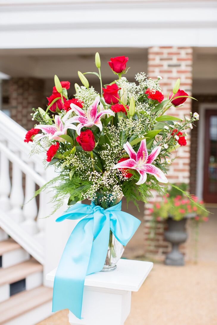 Red and Pink Bouquet With Blue Ribbon