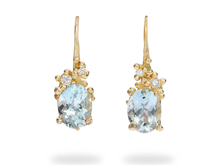 Gold drop cluster earrings with diamonds and oval light blue aquamarine stone