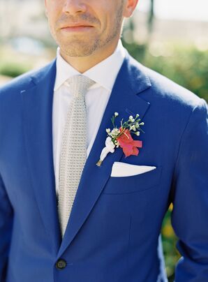 Groom in Blue Suit With Bougainvillea Boutonniere