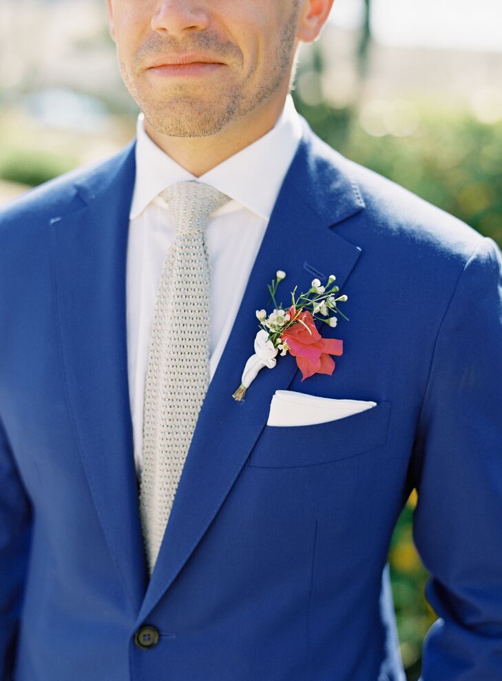 Groom in Blue Suit With Bougainvillea Boutonniere