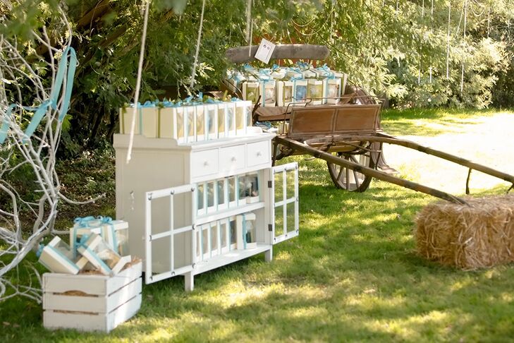 At the reception venue, vintage props and furniture created a country-chic atmosphere.