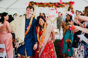 Interfaith Couple Recessing at Tented Ceremony