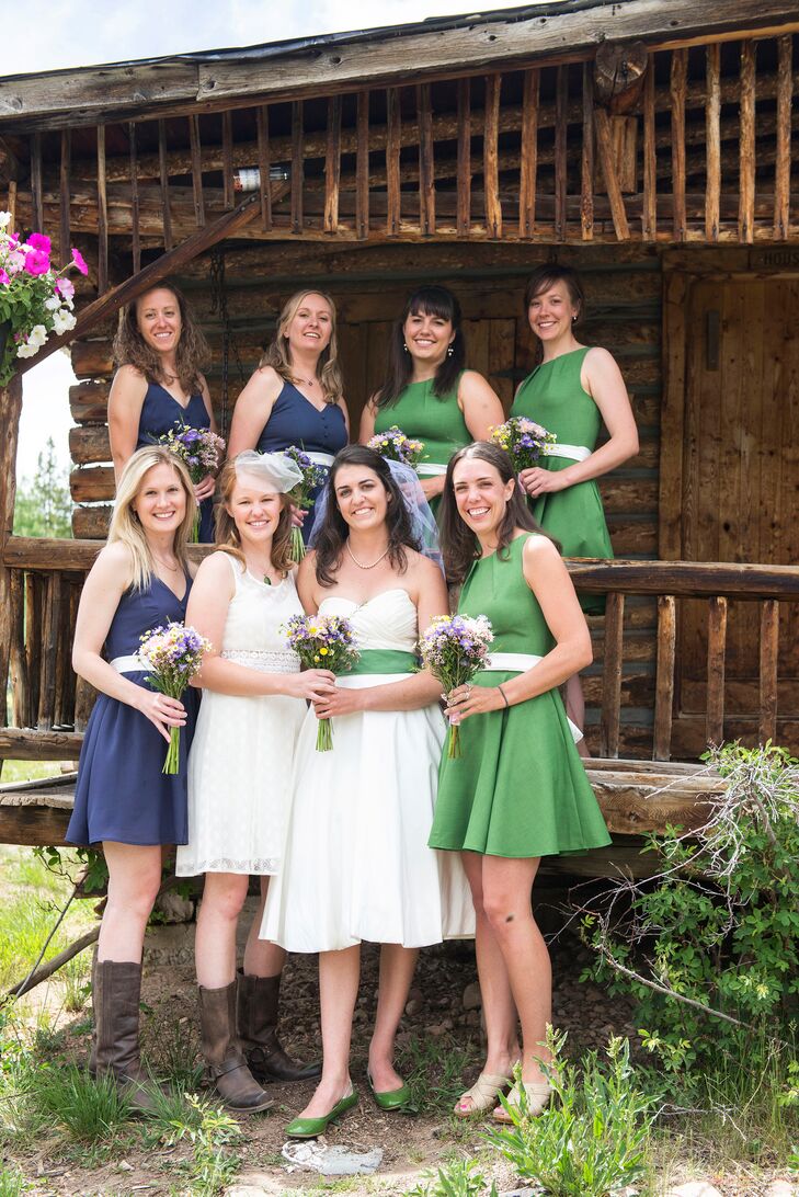 The bridesmaids wore spring dresses from ModCloth. Julie’s side wore navy with cowboy boots, and Elizabeth’s side wore green with whatever shoes they wanted. All of the white belts were made from Elizabeth’s leftover dress.