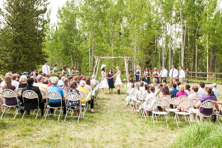 “We wanted an affordable, outdoor location at a place that all of our guests could stay together for the weekend,” Julie says. “We chose a historic homestead on the property secluded in an aspen forest. The old log cabins and historic buildings were just what we wanted for our simple, rustic and occasionally rowdy wedding party.”