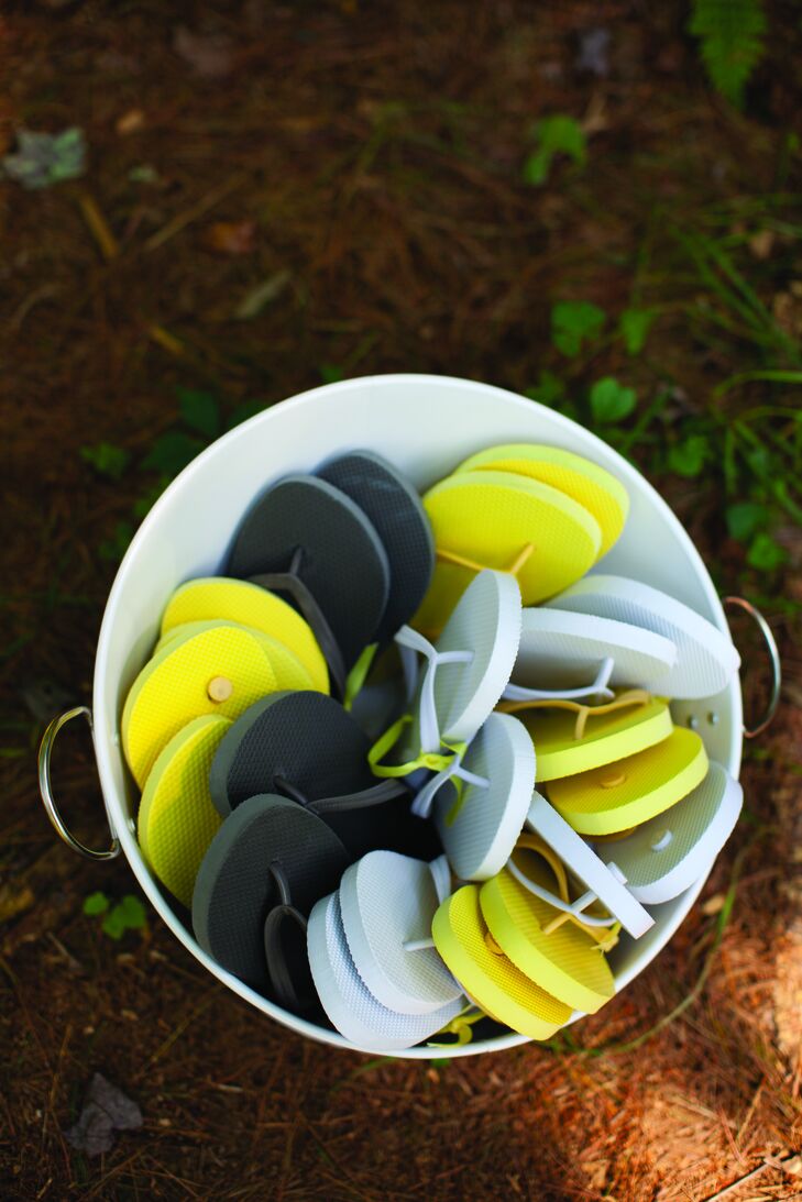 Flip-flops in the couple's color palette were set out for guests looking to rest their feet.
