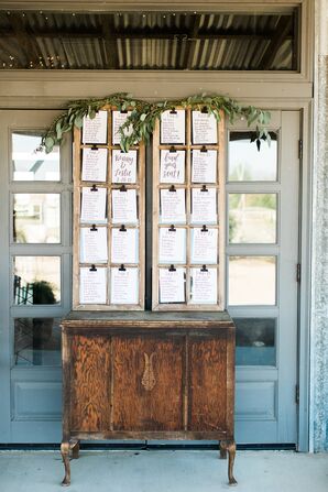 Rustic Seating Chart Display on Vintage Table