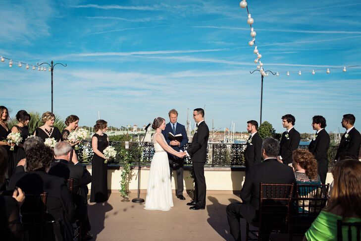 “For my wedding dress, I wanted something classic, vintage and comfortable,” says Alex. After trying on a number of possibilities, Alex found her Elizabeth Dye white illusion-neckline wedding dress at Lovely Bride DC. She paired the look with a birdcage veil, champagne belt and BHLDN shoes.