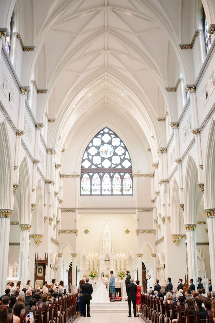 Nina and Tristan exchanged vows in a traditional Catholic ceremony at Cathedral of St. John the Baptist. Afterward, the newlyweds and their parents rode from the church to Lowndes Grove Plantation in Charleston, South Carolina, in a white trolley with mini bottles of prosecco and Michigan IPA on ice to celebrate.