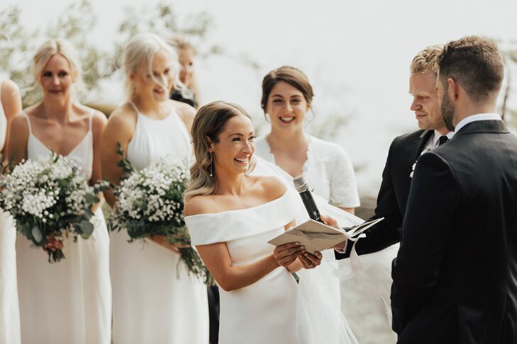Classic Bride and Bridesmaids with White Gowns and Baby's Breath Bouquets