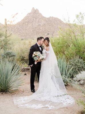 Couple Posing for Portraits in Desert in Scottsdale, Arizona