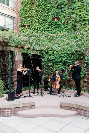 Small Band Playing Classical Instruments at Sophisticated Outdoor Courtyard Cocktail Hour