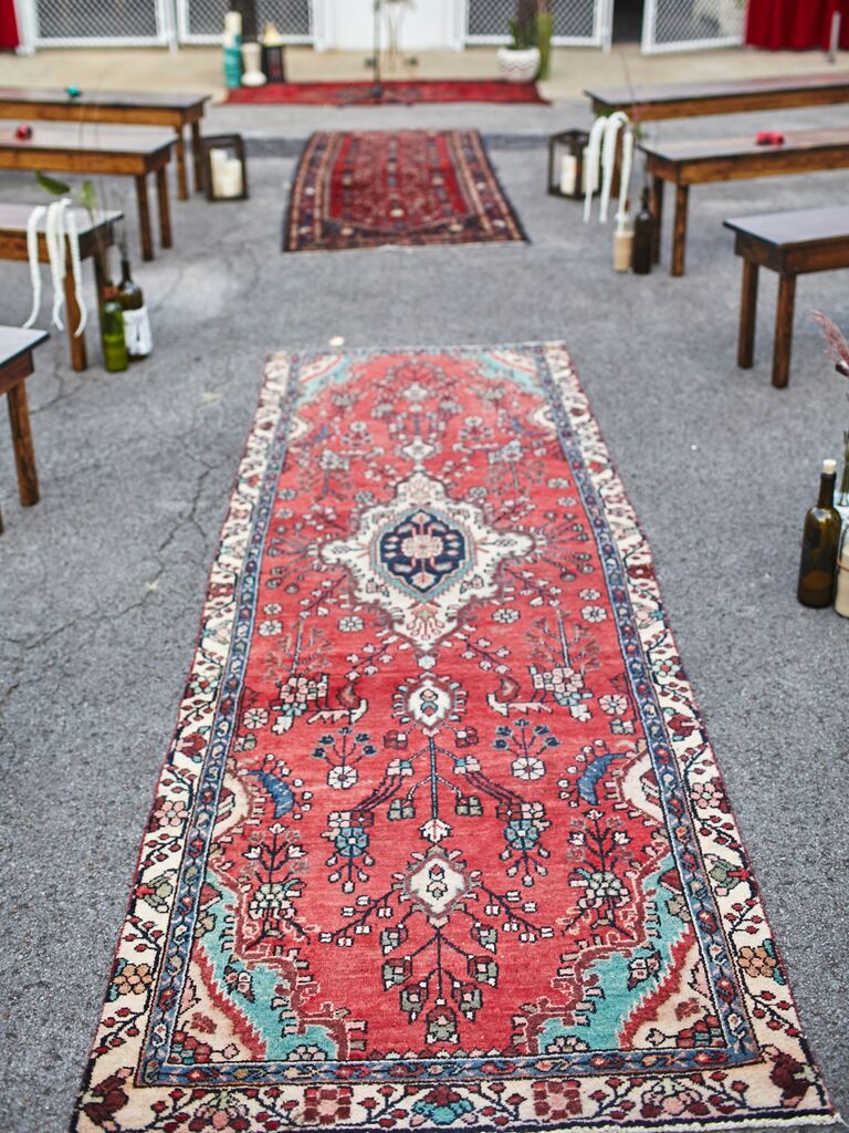 antique red kilim rug as boho wedding ceremony aisle runner 
