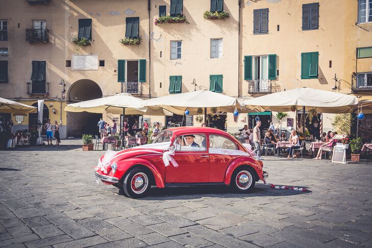 Vintage Car Exit in Lucca, Tuscany, Italy