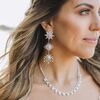 One Couple's Peach-Hued Boho Beach Wedding at Wequasset Resort in Harwich, Massachusetts