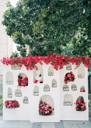 Greek-Inspired White-Stone Escort Card Display With Flowers
